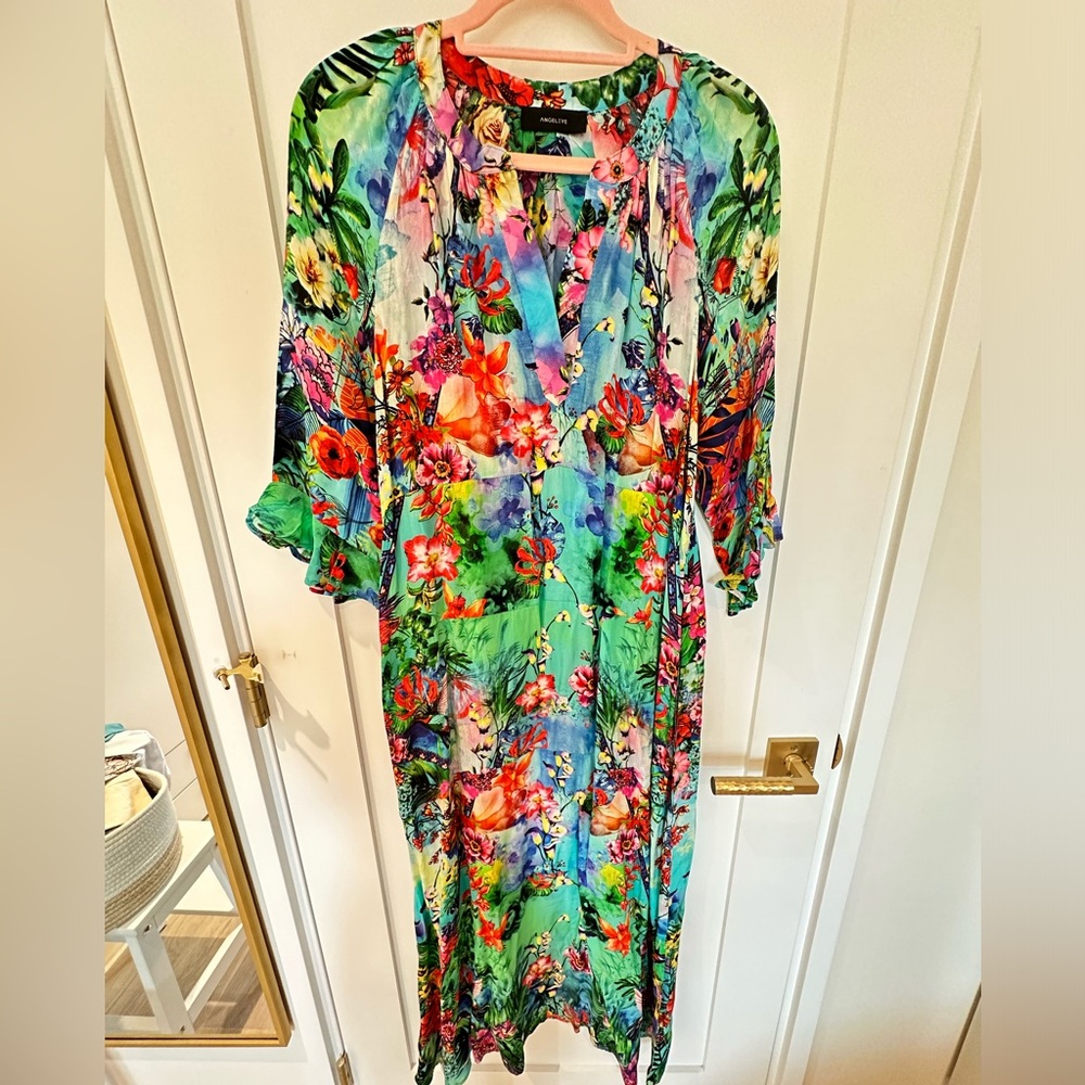ANGEL EYE NWOT Aussie brand. Never worn. Pockets!